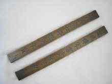 Appraisal: A pair of Chinese bronze scroll weights length cm