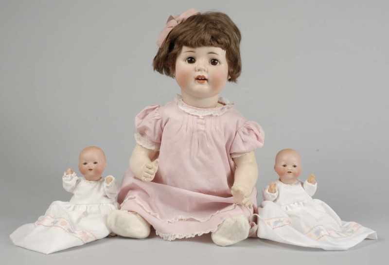 Appraisal: Lot of German Bisque Character Babies Description A M Rock-a-Bye