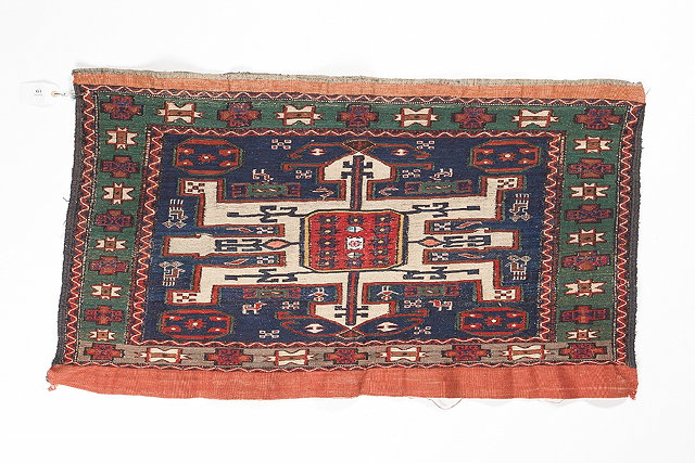 Appraisal: A SOUMAK MAFRASH with central hooked medallion and green ground