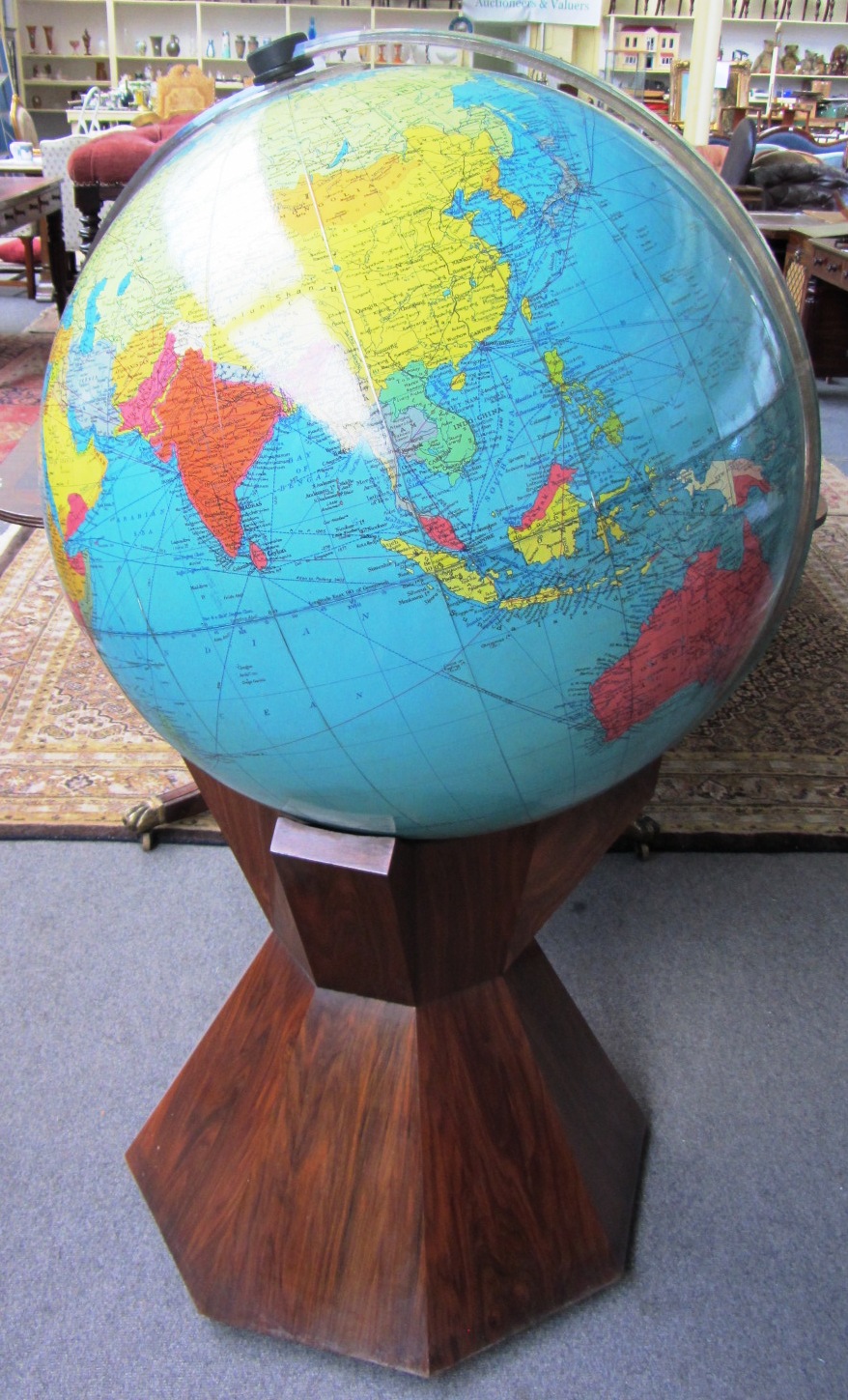 Appraisal: A Georama LTD Terrestrial globe scale on a rosewood shaped