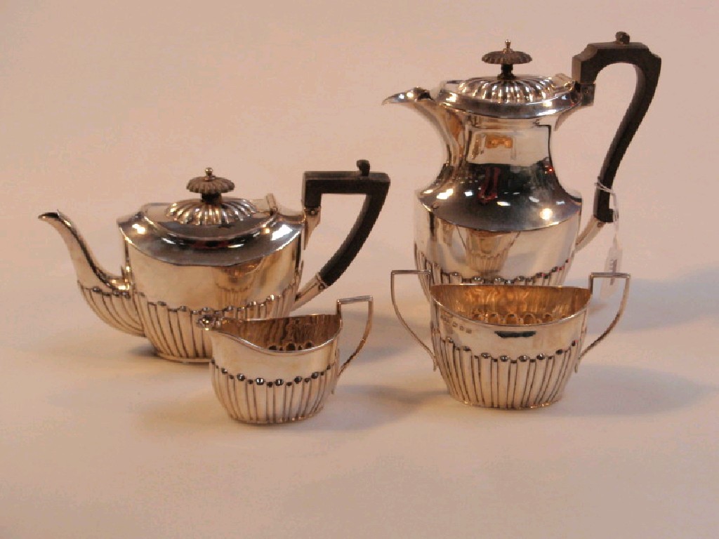 Appraisal: A Harlequin four-piece silver tea set of part reeded form