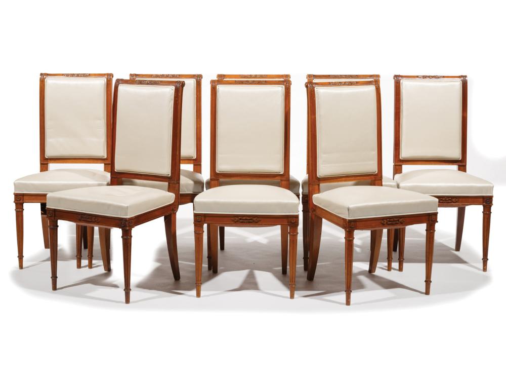 Appraisal: Eight Louis XVI-Style Mahogany Dining Chairs cream leather padded back