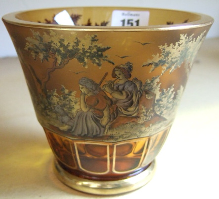 Appraisal: A Czechoslovakian amber glass vase decorated with a pastoral scene