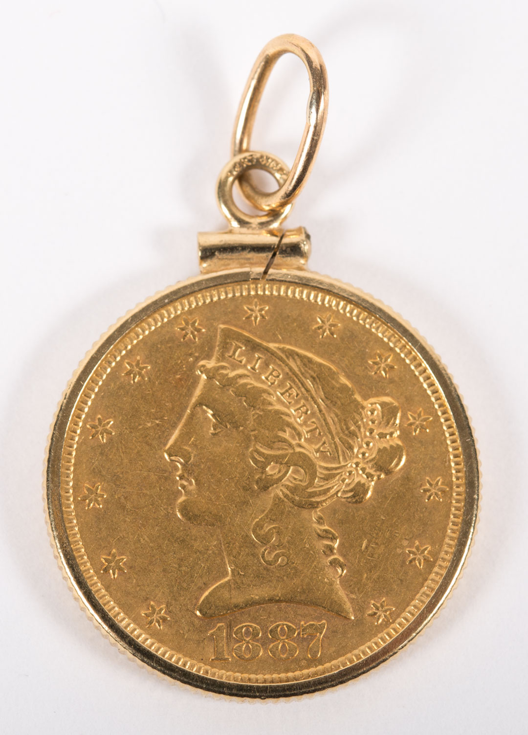 Appraisal: A Gold Coin Pendant solid gold coin from a Coronet