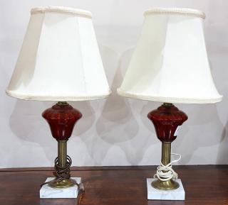 Appraisal: Pair of Victorian gilt metal and cranberry glass oil lamps