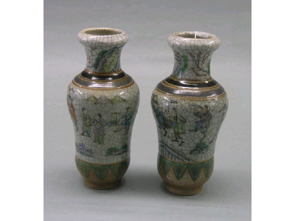 Appraisal: A pair of th century Japanese porcelain vases baluster shape