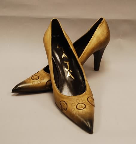 Appraisal: Gaja tan brown leather pumps with decorative stitching and etching