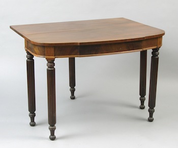 Appraisal: A Sheraton Style Flip-Top Table A Sheraton style flip-top table