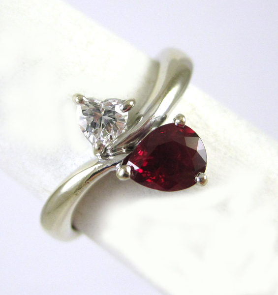 Appraisal: DIAMOND RUBY AND EIGHTEEN KARAT WHITE GOLD RING set with