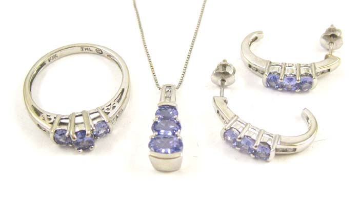 Appraisal: FOUR ARTICLES OF TANZANITE AND DIAMOND JEWELRY including a matching