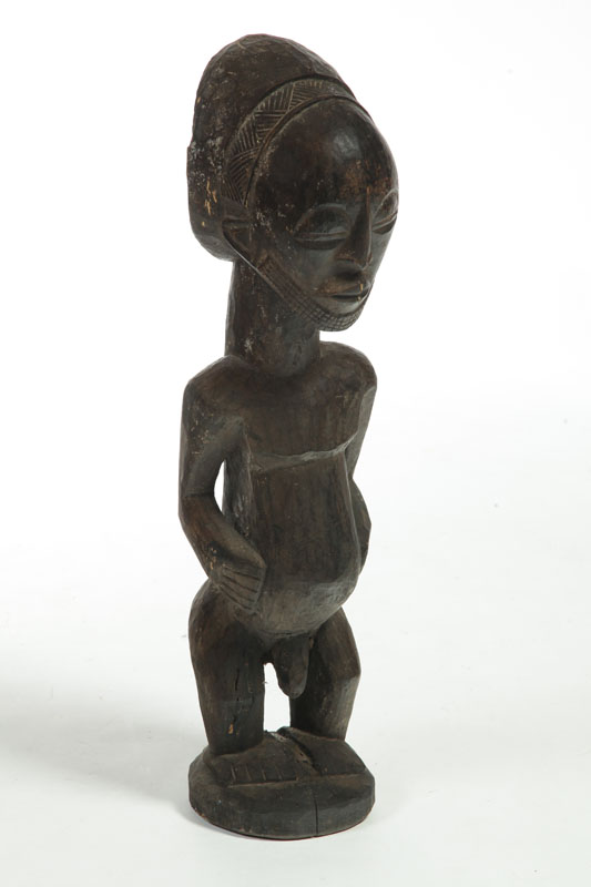 Appraisal: DOGAN FIGURE African rd quarter- th century carved wood Male