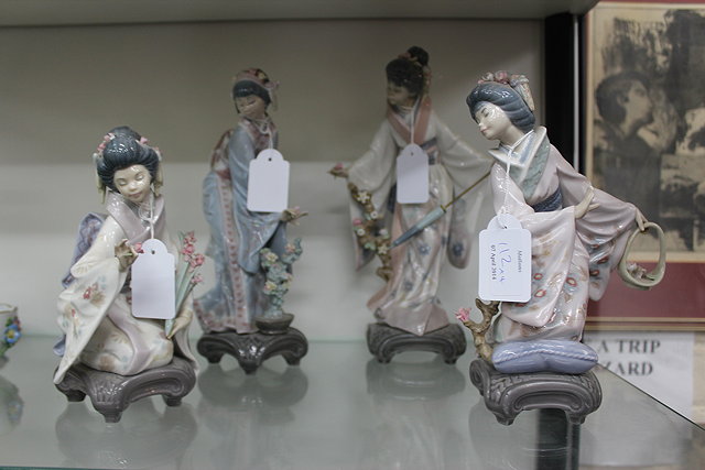 Appraisal: A GROUP OF FOUR LLADRO PORCELAIN FIGURINES of Japanese ladies