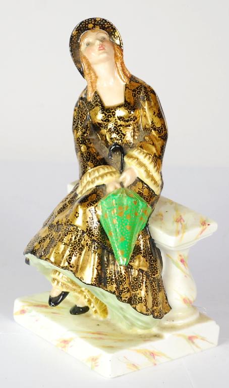 Appraisal: TUSCAN CHINA FIGURE 'APRIL SHOWERS' M painted in colours and