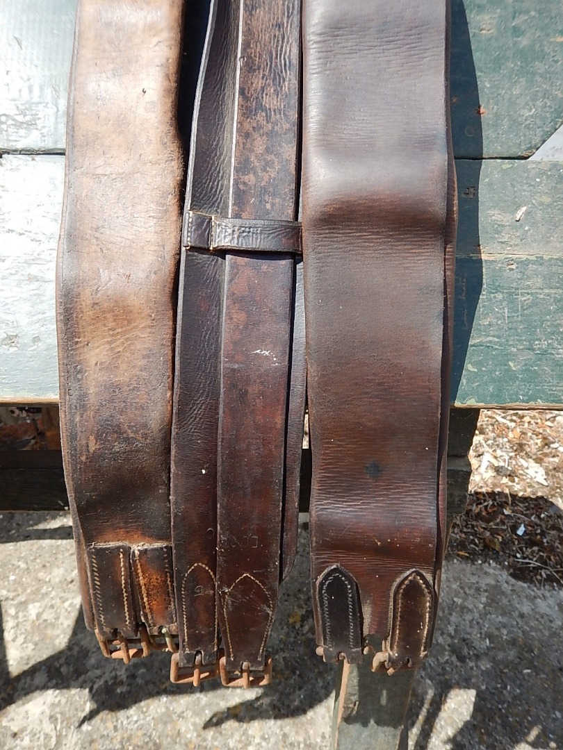 Appraisal: Three broad leather girth straps