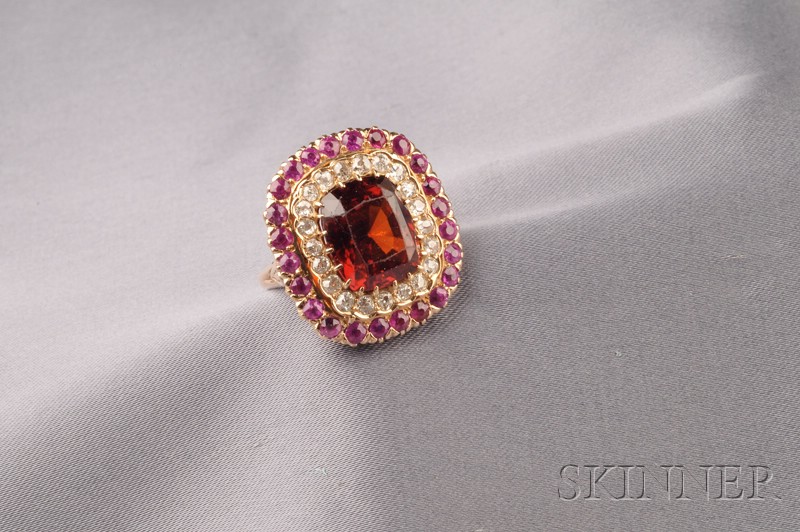 Appraisal: Hessonite Garnet and Diamond Ring prong-set with a cushion-cut hessonite