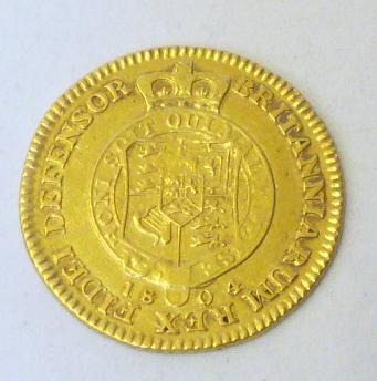 Appraisal: A GEORGE III GOLD HALF GUINEA shield in garter reverse