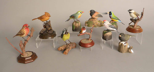 Appraisal: Group of carved songbirds th c five stamped Hand Crafted