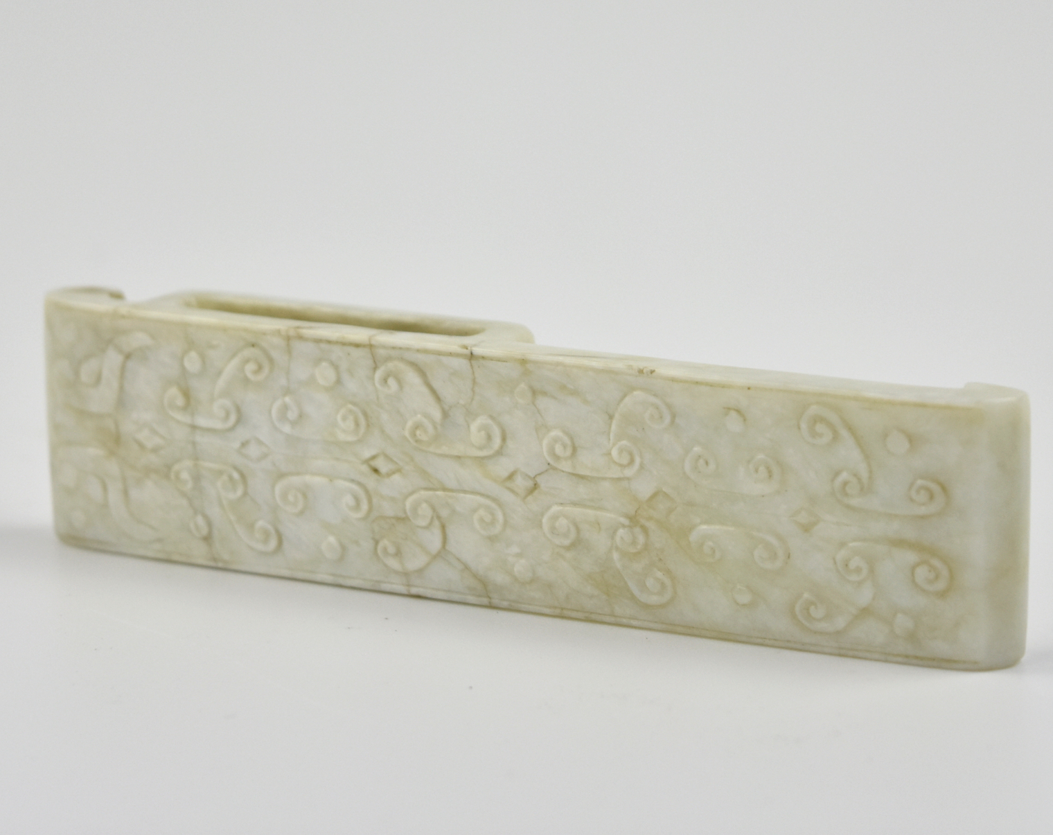 Appraisal: Chinese Qing Dynasty carved with geometric patterns to the surface