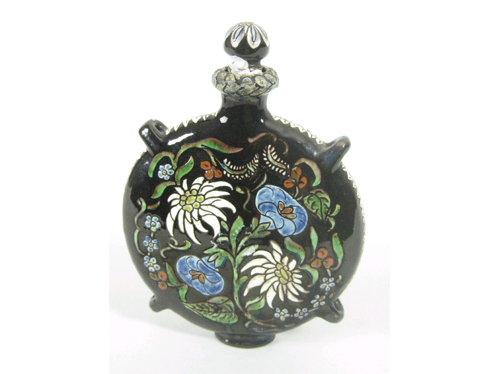 Appraisal: A Thoune pottery Moon Flask with edelweiss and convolvulus decoration