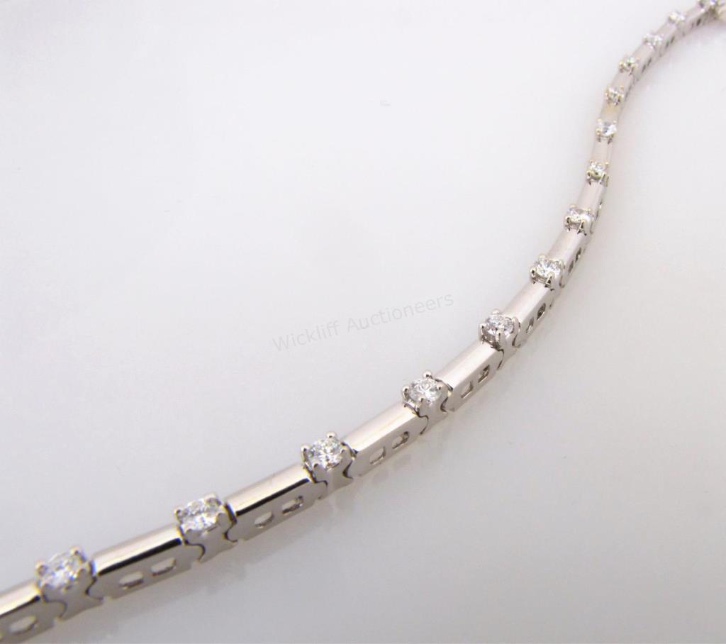 Appraisal: A K white gold bar link bracelet with nineteen round