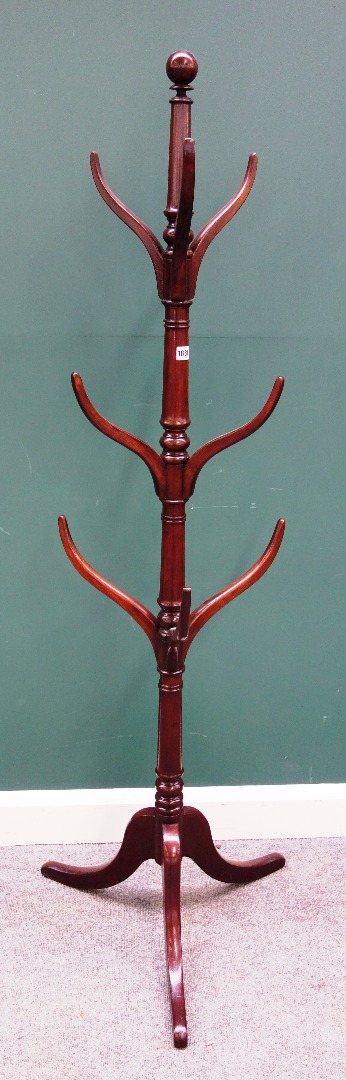 Appraisal: A th century mahogany coat hat stand with turned column