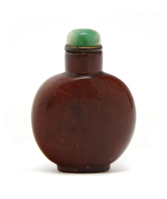 Appraisal: n Amber Snuff Bottle having a green glass stopper Height