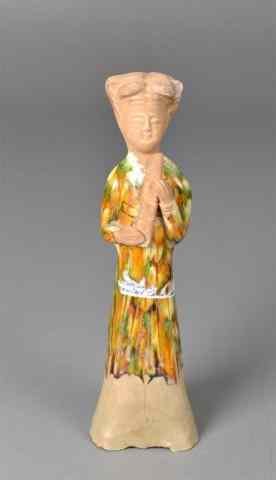 Appraisal: A Chinese Tang Pottery Figure of a LadyMolded to depict