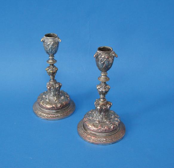 Appraisal: A PAIR OF VICTORIAN PLATE ON COPPER CANDLESTICKS the bodies