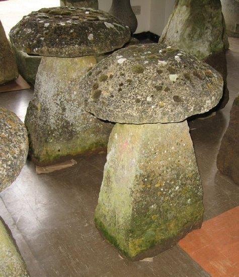 Appraisal: Two th Century Cotswold stone staddle stones with square tapering