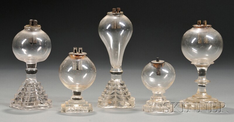 Appraisal: Five Small Free-blown Colorless Glass Lamps with Pressed Glass Bases