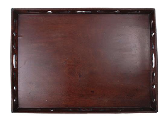 Appraisal: English mahogany serving tray mid th century rectangular form with