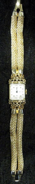 Appraisal: Lady's karat gold wristwatch Lucien Piccard Square case silver tone