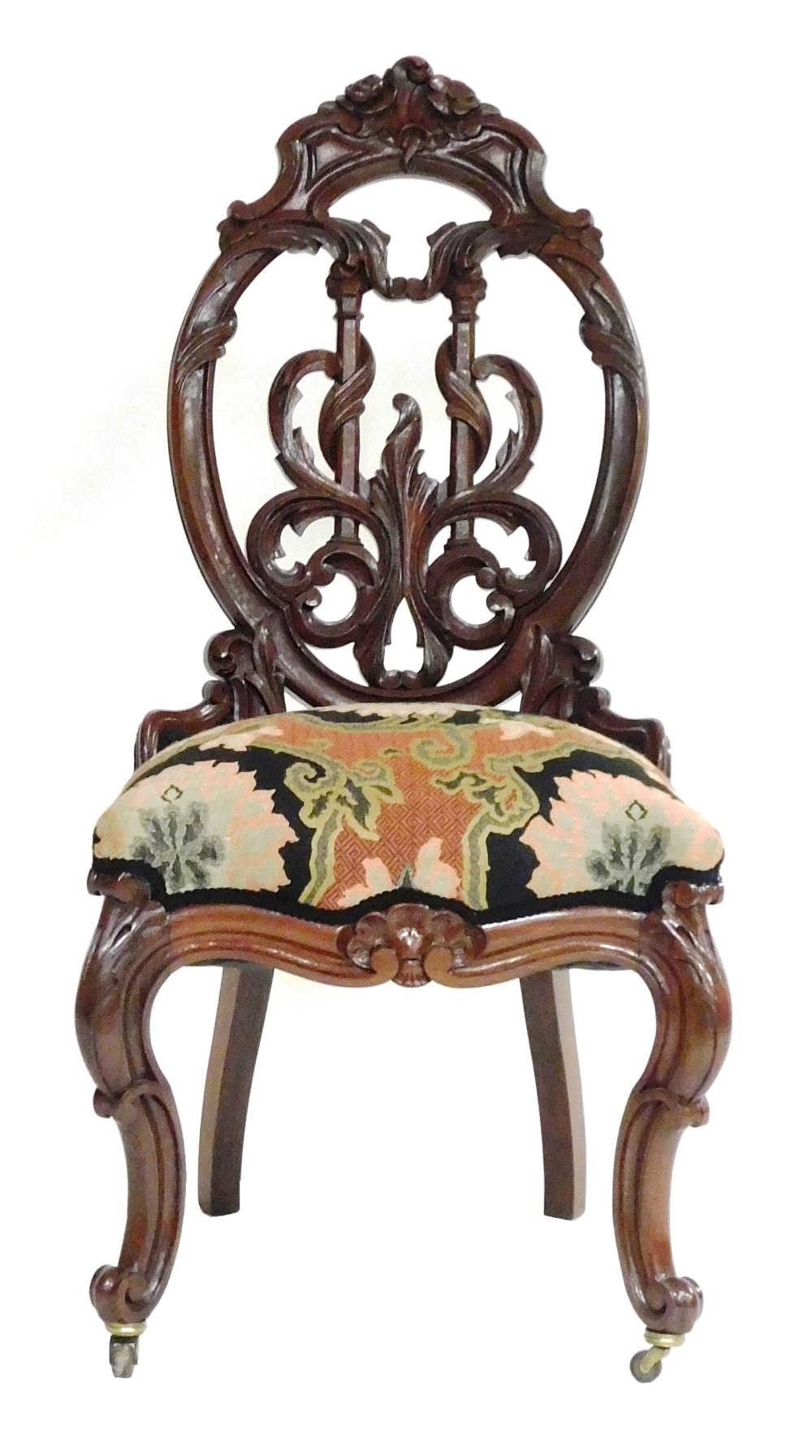 Appraisal: Victorian Rosewood side chair balloon back ornately carved floral design