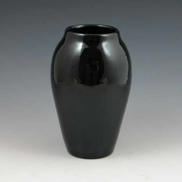 Appraisal: Cliftwood mirror black vase Marked with original paper label Mint