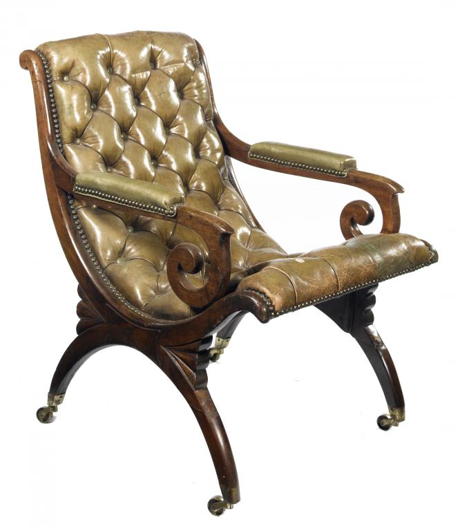 Appraisal: A VICTORIAN MAHOGANY ARMCHAIR in close nailed and buttoned green