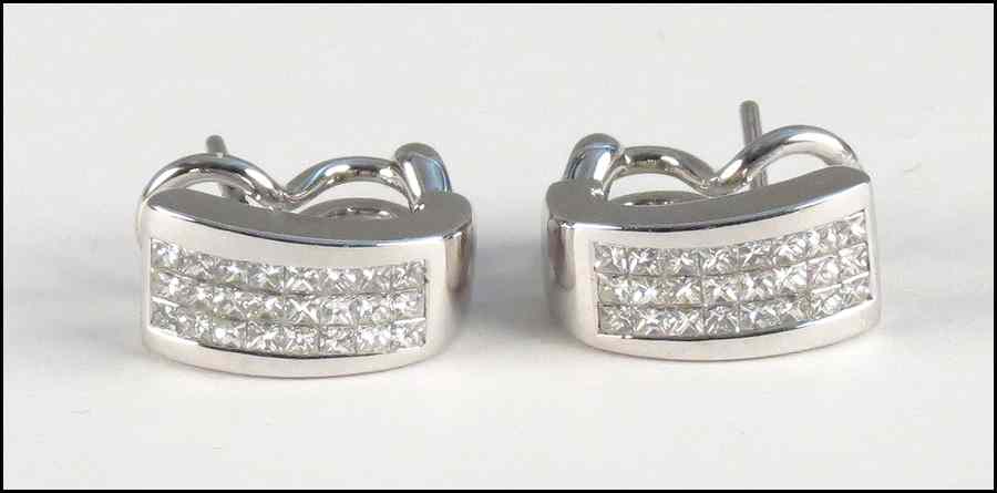 Appraisal: PAIR OF DIAMOND AND KARAT WHITE GOLD EARRINGS Invisible set