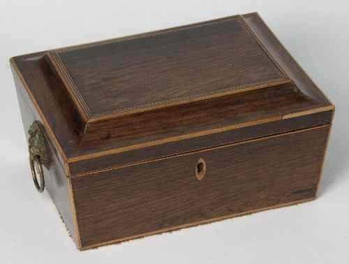 Appraisal: A Regency rosewood workbox with hinged cover and boxwood stringing