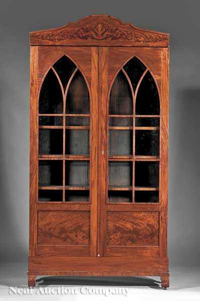 Appraisal: An American Gothic Carved Mahogany Bookcase early th c shaped