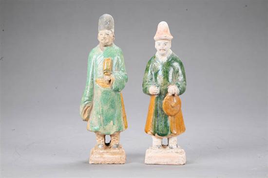 Appraisal: TWO ORIENTAL PORCELEIN FIGURES Musicians standing with green and yellow