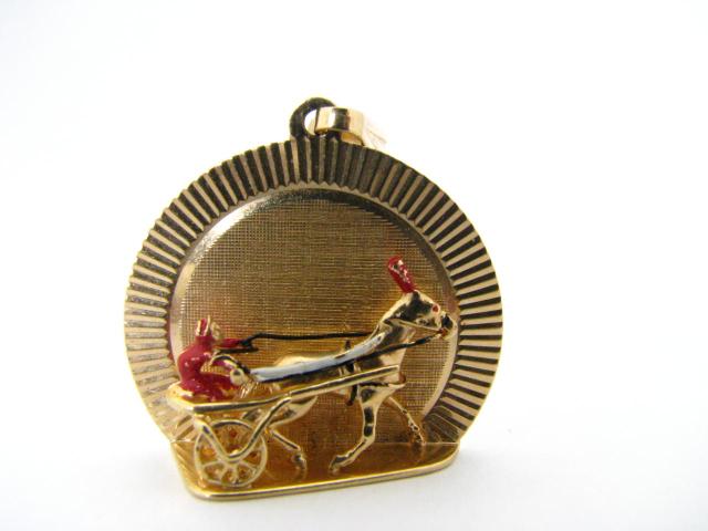 Appraisal: K Yellow Gold Sulky Racer Pendant with enameling