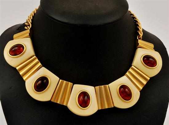 Appraisal: A NECKLACE BY YVES SAINT LAURENT Comprising faux ivory panels