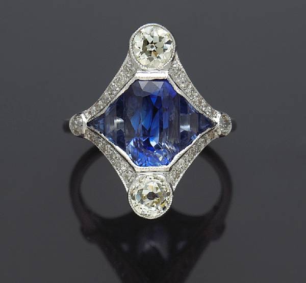 Appraisal: A sapphire and diamond ring principal sapphire weighing an estimated