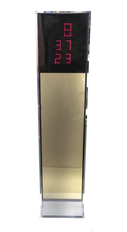 Appraisal: HOWARD MILLER S CHROME DIGITAL CLOCKFloor clock midcentury modern period