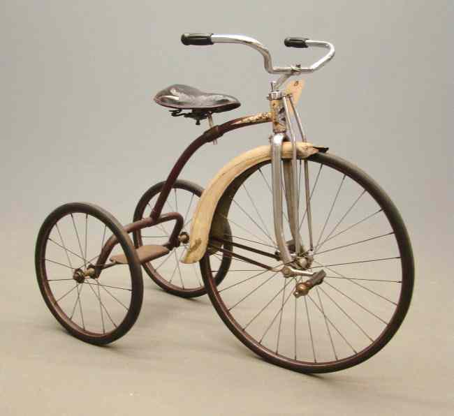 Appraisal: Prewar Columbia tricycle having skirted front fender with truss rods