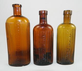 Appraisal: amber Poison bottles Poison- oval amber with vertical ribbing -