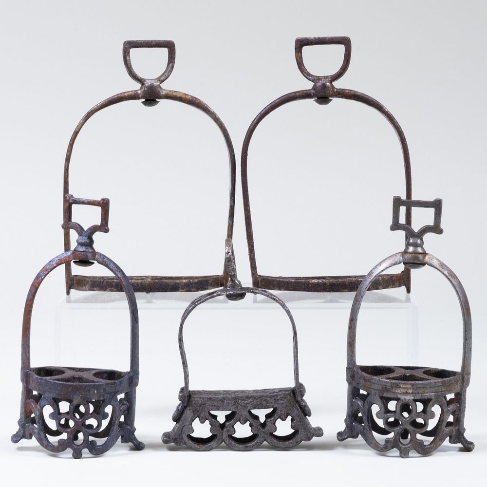 Appraisal: Group of Five Continental Cast Metal Stirrups Comprising A pair