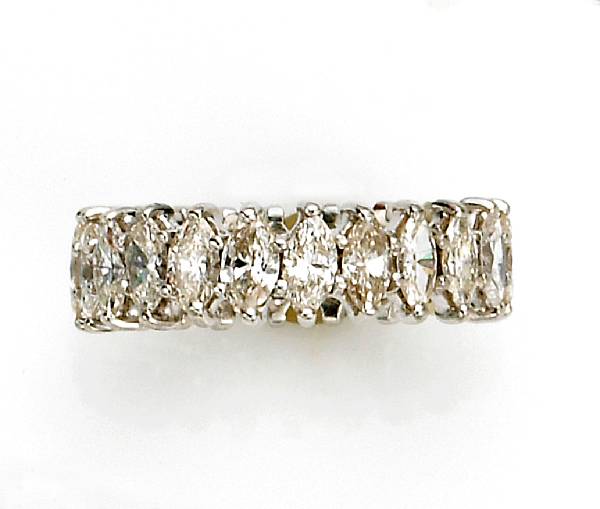 Appraisal: A diamond eternity band estimated total diamond weight carats mounted