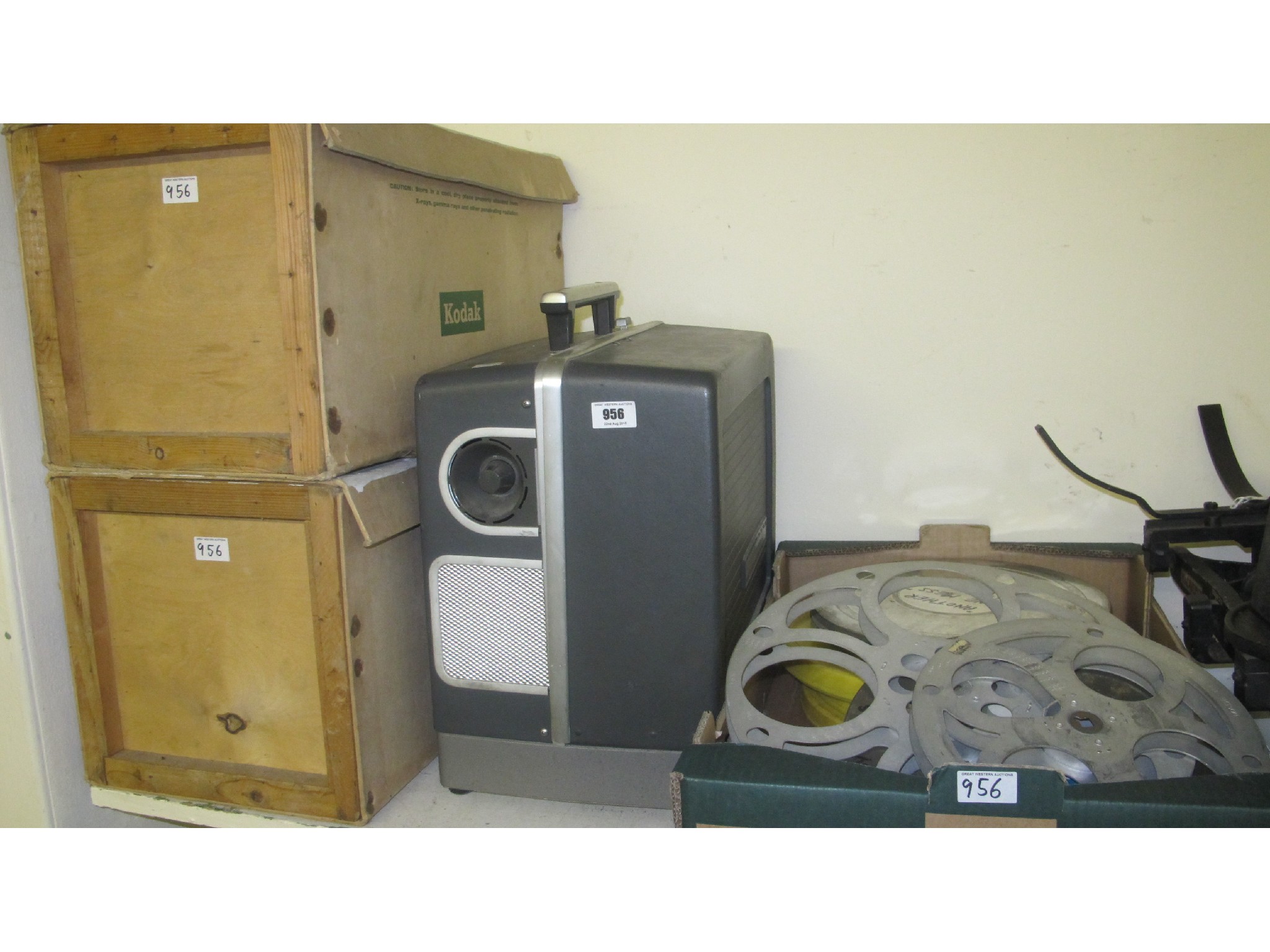 Appraisal: A projector with assorted reels