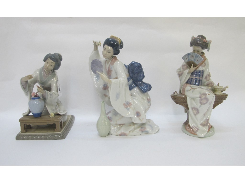 Appraisal: Three Lladro figures of geishas to include Japanese Girl Decorating'