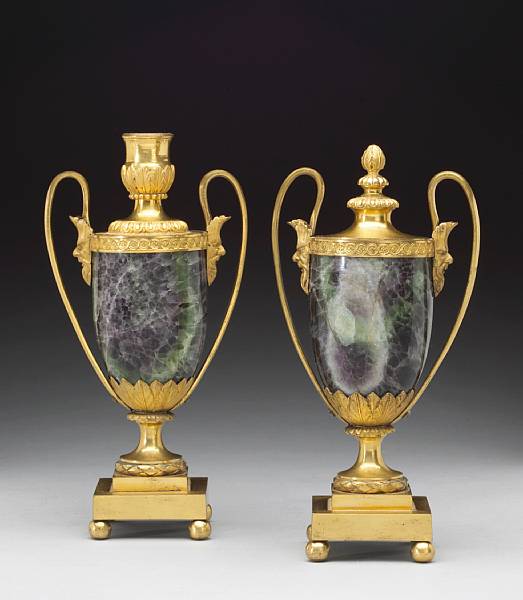 Appraisal: A pair of George III gilt bronze mounted blue john